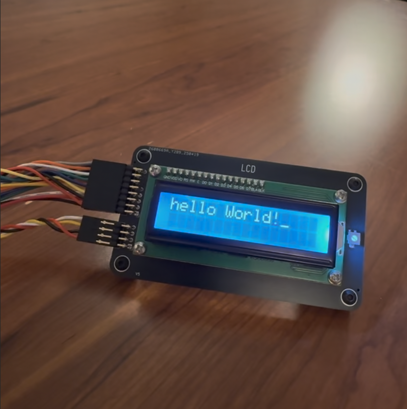 Apple I replica displaying Hello World on an LCD